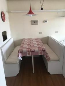 Posedenie v ubytovaní Appartamento con vista unica Condominio Grand'Ourse
