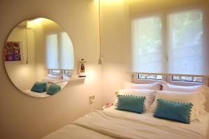 Posteľ alebo postele v izbe v ubytovaní Gallery Suites Parga
