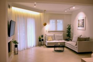 Posedenie v ubytovaní Gallery Suites Parga