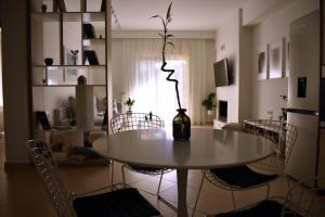 Posedenie v ubytovaní Gallery Suites Parga