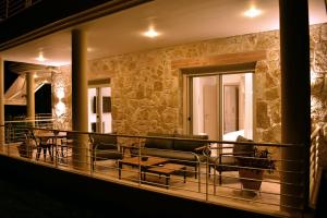 Posedenie v ubytovaní Gallery Suites Parga