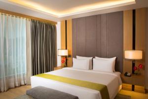 Postel nebo postele na pokoji v ubytování Radisson Blu Hotel Guwahati