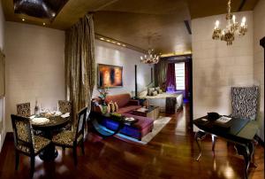 Posezení v ubytování Radisson Blu MBD Hotel Noida