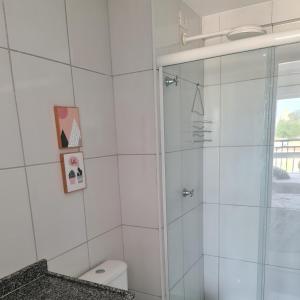 a bathroom with a shower and a toilet at Flat 308 in Teresina