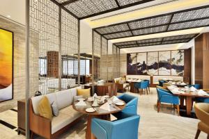 A restaurant or other place to eat at Radisson Blu Faridabad