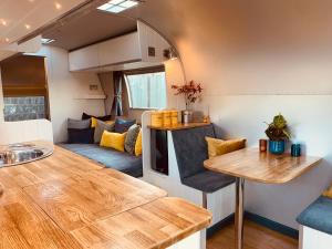 a kitchen and living room in a tiny house at Vintage 1962 airstream in Oxford