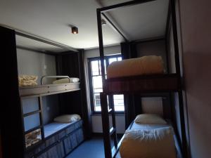 Postel nebo postele na pokoji v ubytování Brxxl 5 City Centre Hostel + 31 fotografií