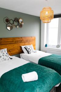 Кровать или кровати в номере Portland Apartments 198 by #ShortStaysAway
