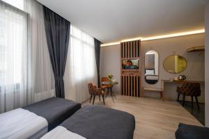 Ein Bett oder Betten in einem Zimmer der Unterkunft Seyithan Palace Spa Hotel