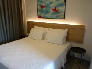 เตียงในห้องที่ Comfort Suites & Rooms