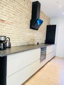 Cuina o zona de cuina de aday - Central cozy and bright apartment