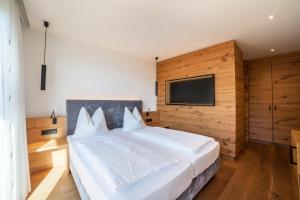 Postel nebo postele na pokoji v ubytování Oberegghof Ferienwohnung Ifinger