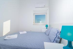 Katil atau katil-katil dalam bilik di SEA VIEW APARTMENT