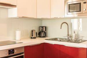 Dapur atau dapur kecil di SEA VIEW APARTMENT