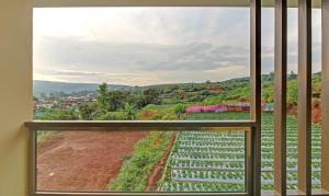 Balkón nebo terasa v ubytování Treebo Mountain Retreat Mahabaleshwar, 600 Mtrs From Lingmala Waterfall
