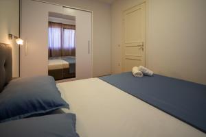 Postel nebo postele na pokoji v ubytování Apartman Antea 1