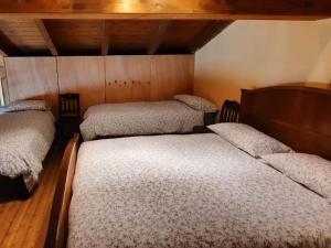 Postel nebo postele na pokoji v ubytování Cascina Ca' Scarlatta - Your Mountain Holiday