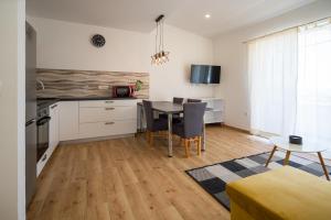 Kuchyň nebo kuchyňský kout v ubytování Apartman Antea 1