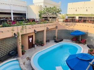 Piscina en o cerca de Al Liwan Suites