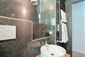 Koupelna v ubytování MK - Apartment Soderini