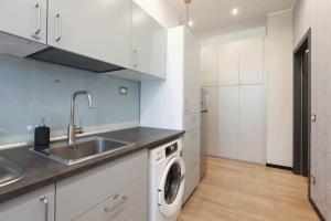 Kuchyň nebo kuchyňský kout v ubytování MK - Apartment Soderini