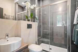 Koupelna v ubytování MK - Apartment Soderini