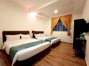 Postel nebo postele na pokoji v ubytování Comfort Hotel