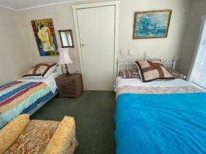 A bed or beds in a room at Green garden home