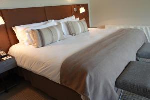 Postel nebo postele na pokoji v ubytování Hotel Los Españoles Plus