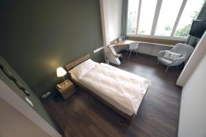 
Ein Bett oder Betten in einem Zimmer der Unterkunft Hotel und Seminarhaus Ländli

