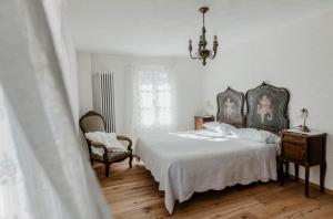 Katil atau katil-katil dalam bilik di La Corte di Lu