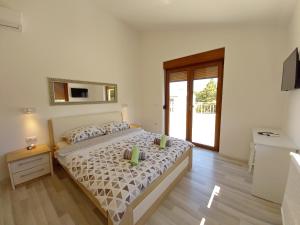 Postel nebo postele na pokoji v ubytování Villa Markulin, Šišan + 37 fotografií
