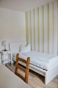 Ein Bett oder Betten in einem Zimmer der Unterkunft Landgasthof Hotel Will