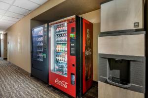 a couple of vending machines in a room with drinks at Comfort Inn in Story City