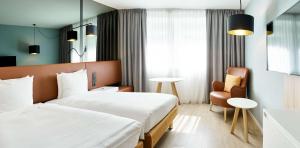 Postel nebo postele na pokoji v ubytování Radisson BLU Balmoral