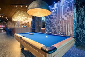 Biliár nebo kulečník v ubytování Falkensteiner Family Hotel Diadora