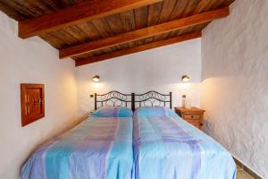 
Cama o camas de una habitación en Casa Rural Los Escobones
