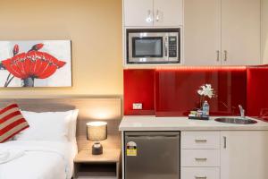 Kuchyň nebo kuchyňský kout v ubytování Best Western Plus Camperdown Suites