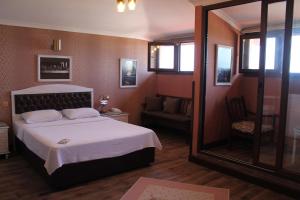 Bella View Art Boutique Hotel客房内的一张或多张床位