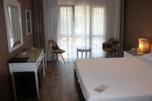 Bella View Art Boutique Hotel客房内的一张或多张床位