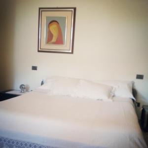 A bed or beds in a room at Villa Celeste