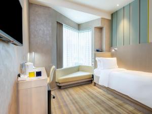 Katil atau katil-katil dalam bilik di Holiday Inn Express Hong Kong Mongkok by IHG