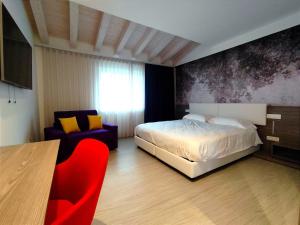 Posteľ alebo postele v izbe v ubytovaní Hotel Luna