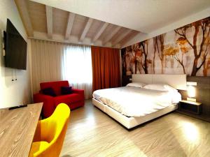 Posteľ alebo postele v izbe v ubytovaní Hotel Luna