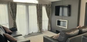 Fotografie z fotogalerie ubytování Lakeside Cotswold Holiday Home v destinaci Cirencester