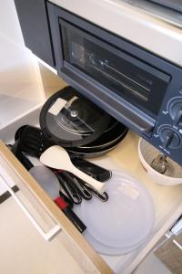 A kitchen or kitchenette at オザッキー大室高原4丁目