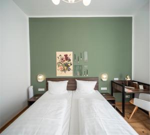 Postel nebo postele na pokoji v ubytování acor Boutique Hotel