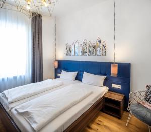 Postel nebo postele na pokoji v ubytování acor Boutique Hotel