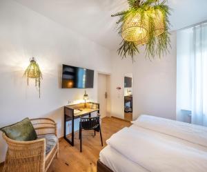 Postel nebo postele na pokoji v ubytování acor Boutique Hotel