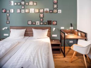 Postel nebo postele na pokoji v ubytování acor Boutique Hotel